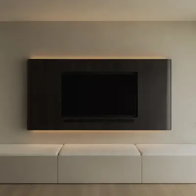 Televisie in een donker houten paneel met indirect licht boven een lage zitbank, Appartement in Nieuwpoort, interieur Laura Calleeuw