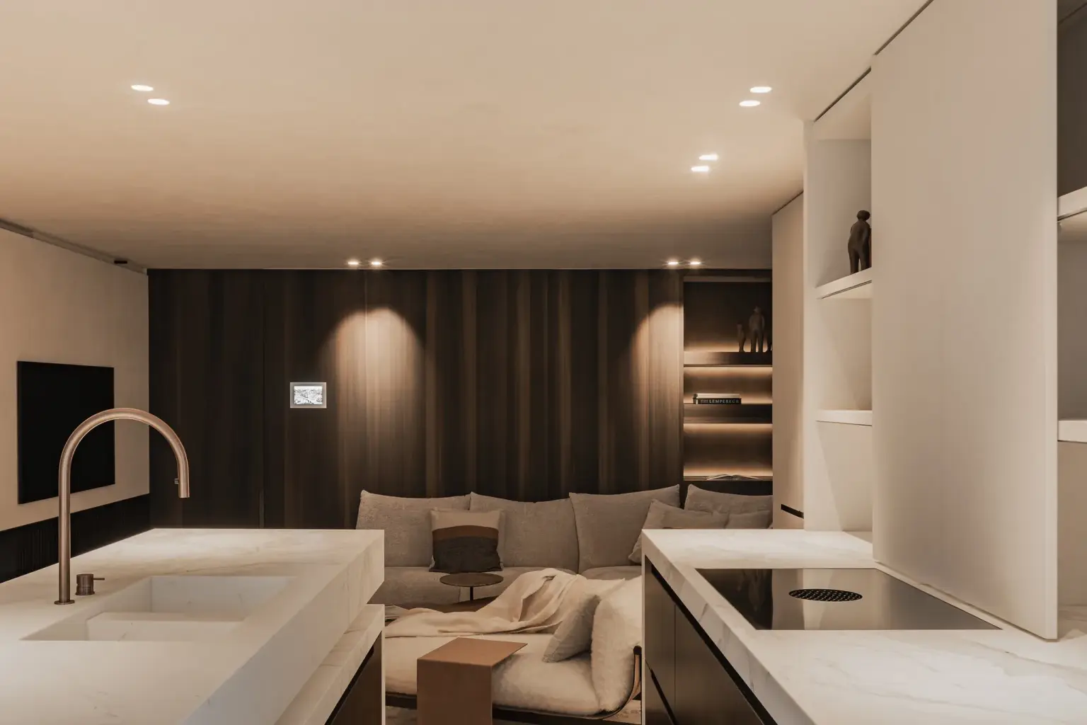 Keuken met koperen kraan en kookeiland voor een notelaren wand met zithoek achteraan, Penthouse in Kortrijk, interieur Laura Calleeuw