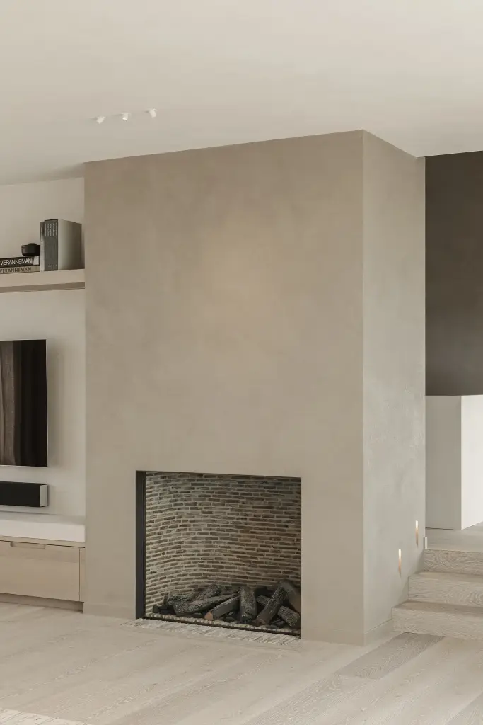 Microcement schouw met gashaard en houtblokken, where architecture creates space for experience, interieur Laura Calleeuw