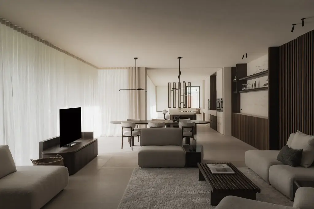 Open leefruimte met zithoek, televisie, ovale eettafel en keuken, Nieuwbouwwoning in Roeselare, interieur Laura Calleeuw
