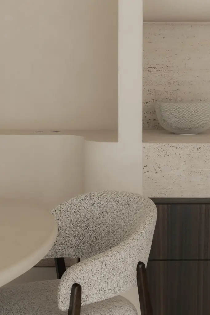 Detail van afgeronde zitbank, tafel en travertijn in de eethoek, Nieuwbouwwoning in Roeselare, interieur Laura Calleeuw