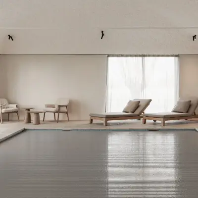 Zwembad met ligstoelen, fauteuils en rolluik over het water, Schuur in Westkapelle, interieur Laura Calleeuw